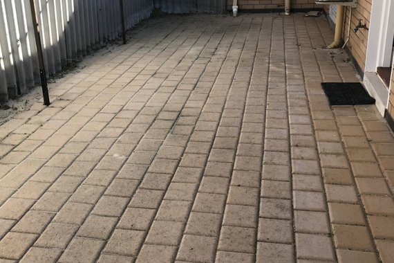 Block paving cleared from weeds